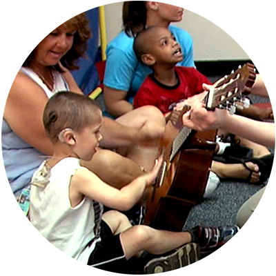 children with special needs enjoying music class