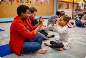 Families engaged in Music Together class