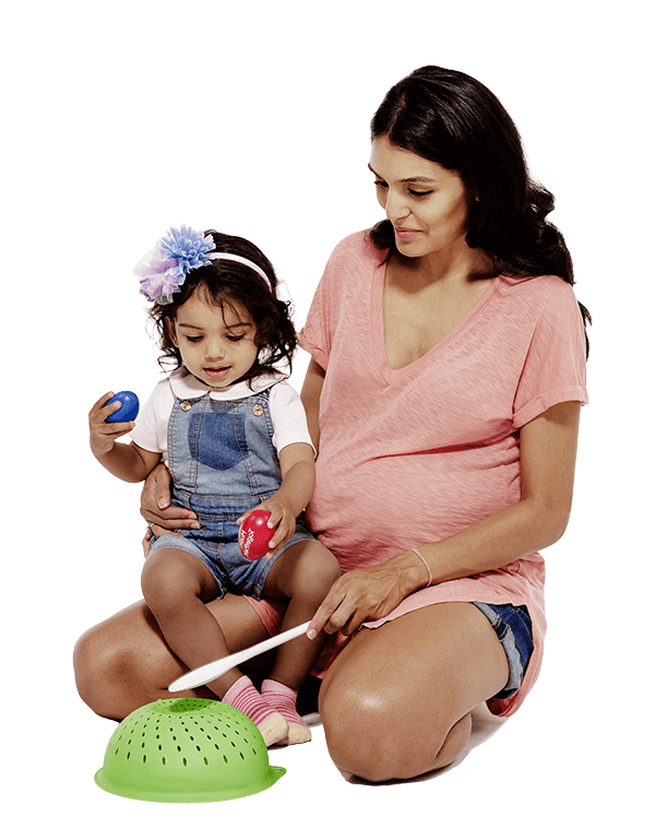 Mom and child playing kitchen instruments and shakers