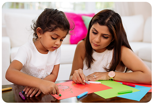 Mom and Daughter Drawing Together