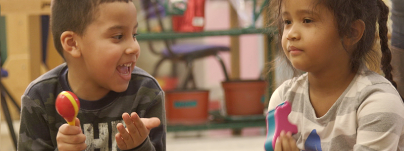 children making music at school