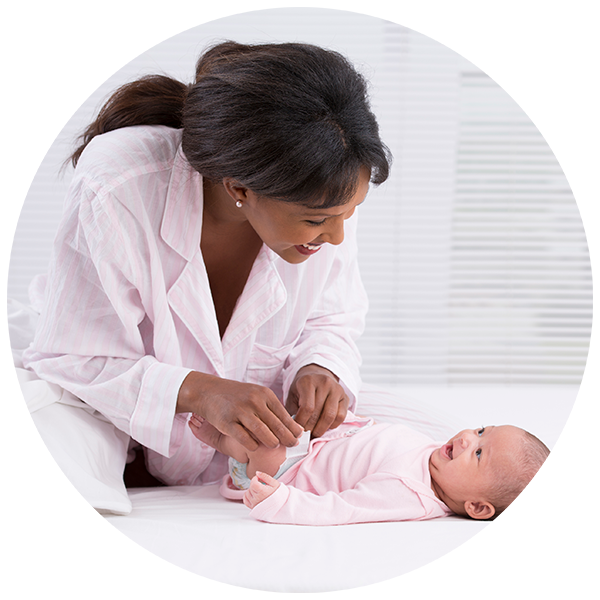 Mother looking at baby and baby up to mom